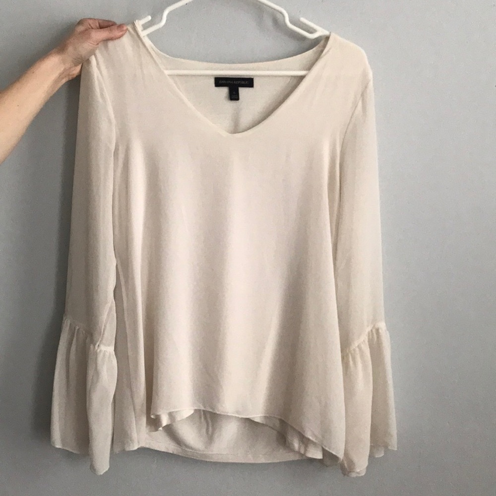 White bell sleeve blouse